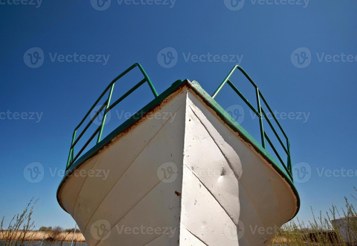 Beached fishing boat photo