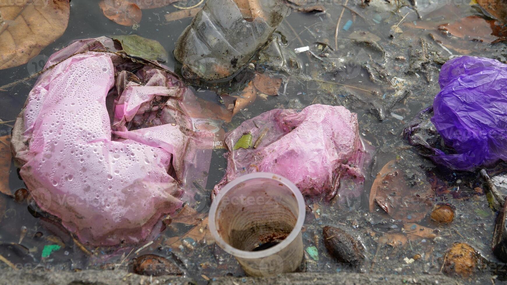 River that is polluted with various garbage and trash, Polluted rivers, photography photo