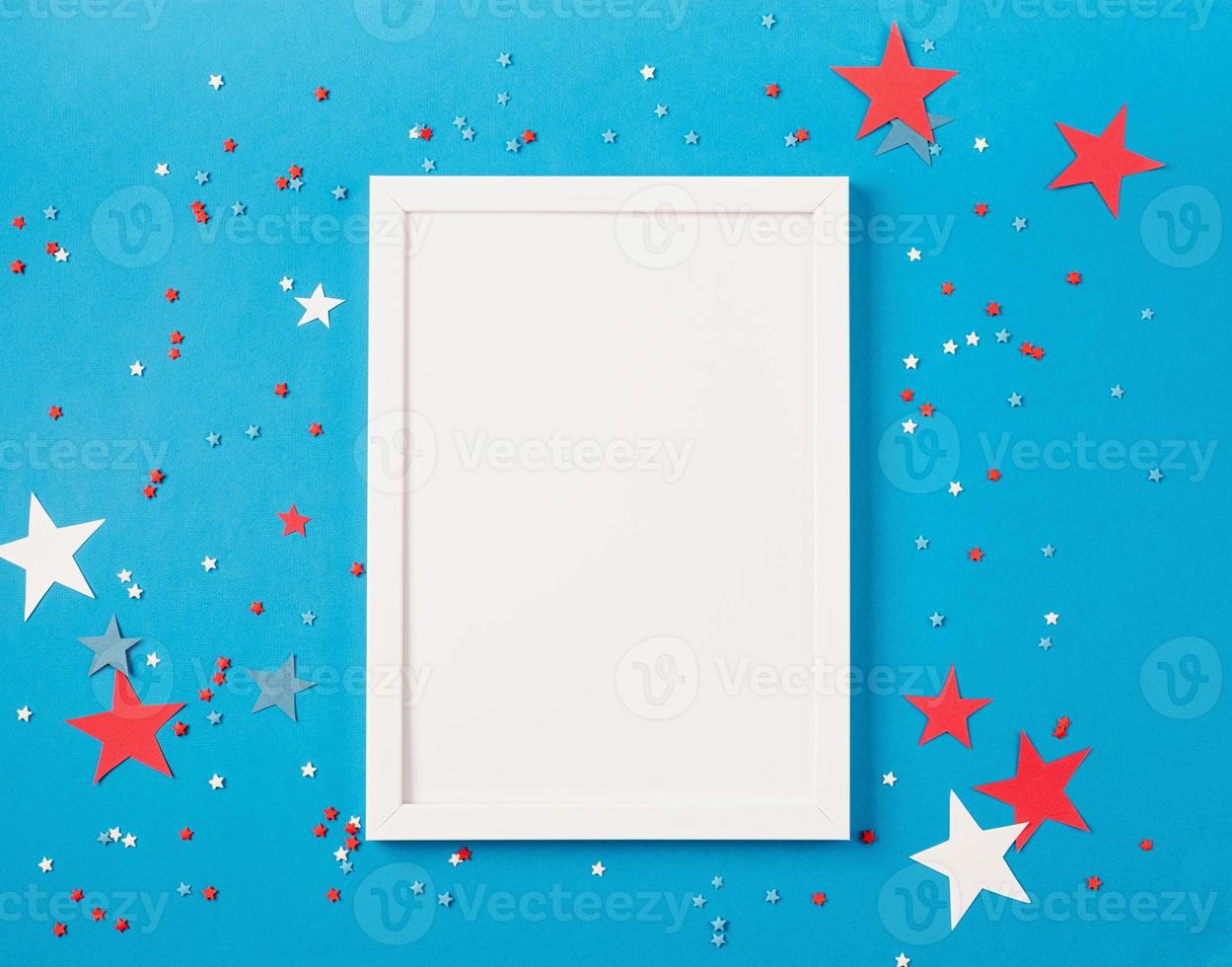 USA independence day party elements top view flat lay on blue with frame for mockup photo
