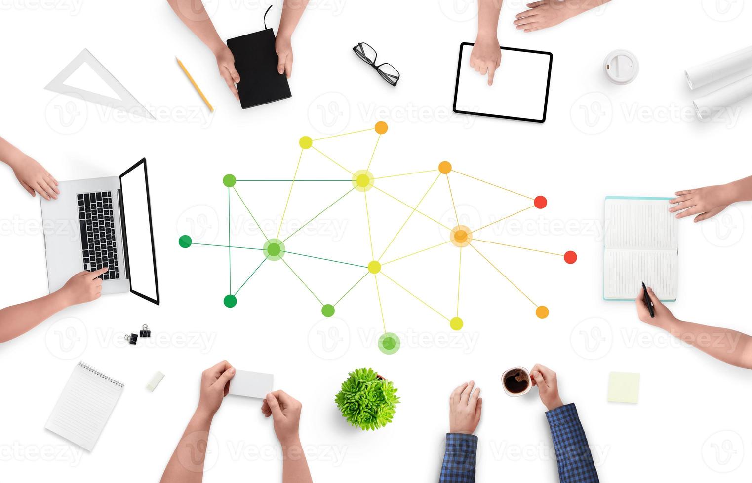 Professional networking concept with people siting on work desk and networking pins in the middle. Green, yellow, orange, red wires on white desk. Top view, flat lay photo