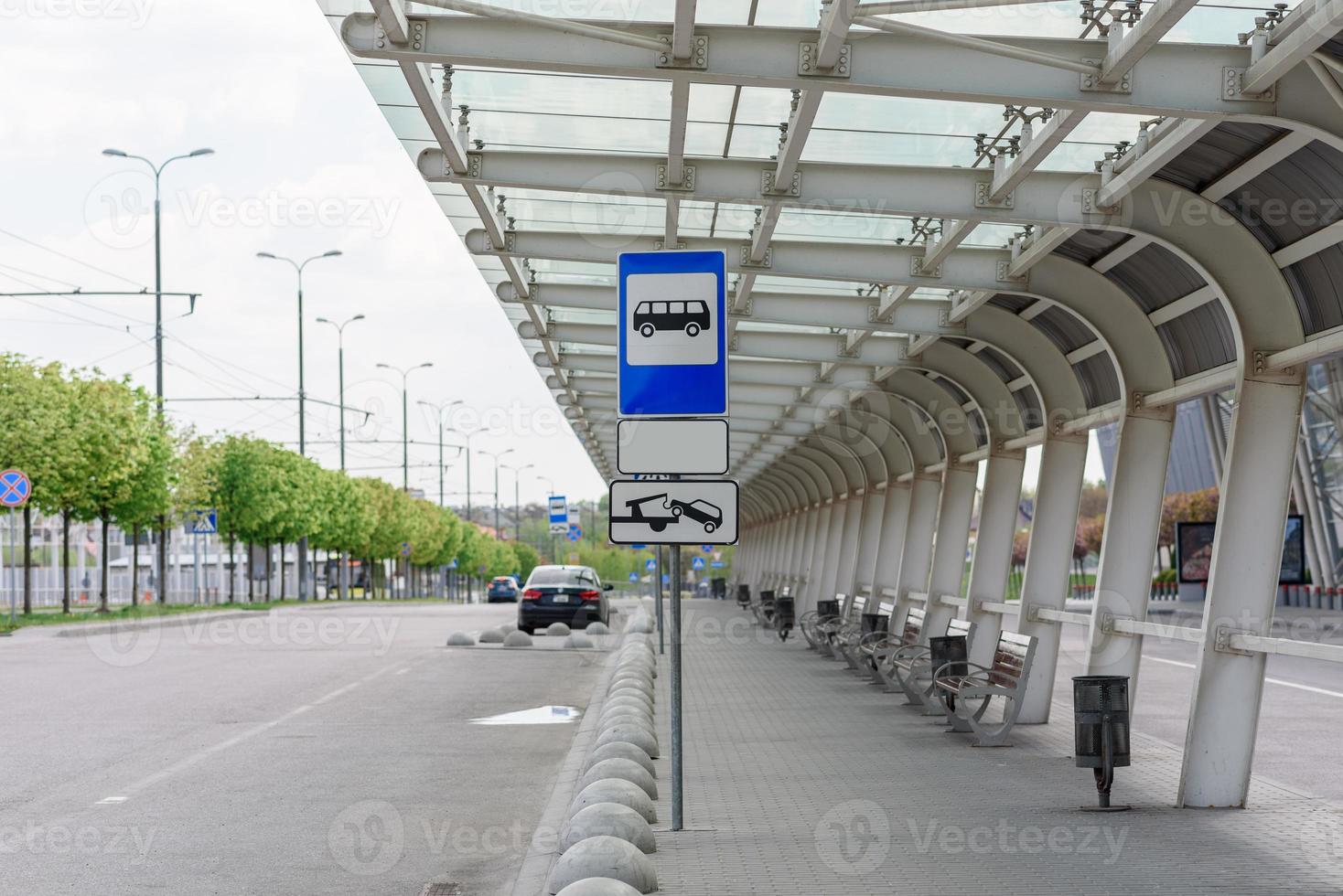 Empty big bus stop near the airport. photo