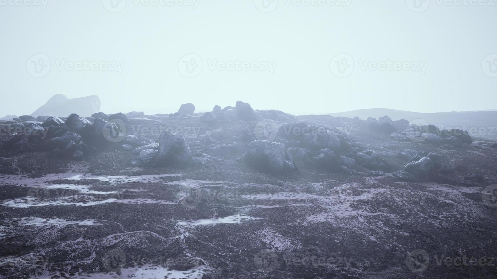 Mountain landscape covered with snow and ice photo