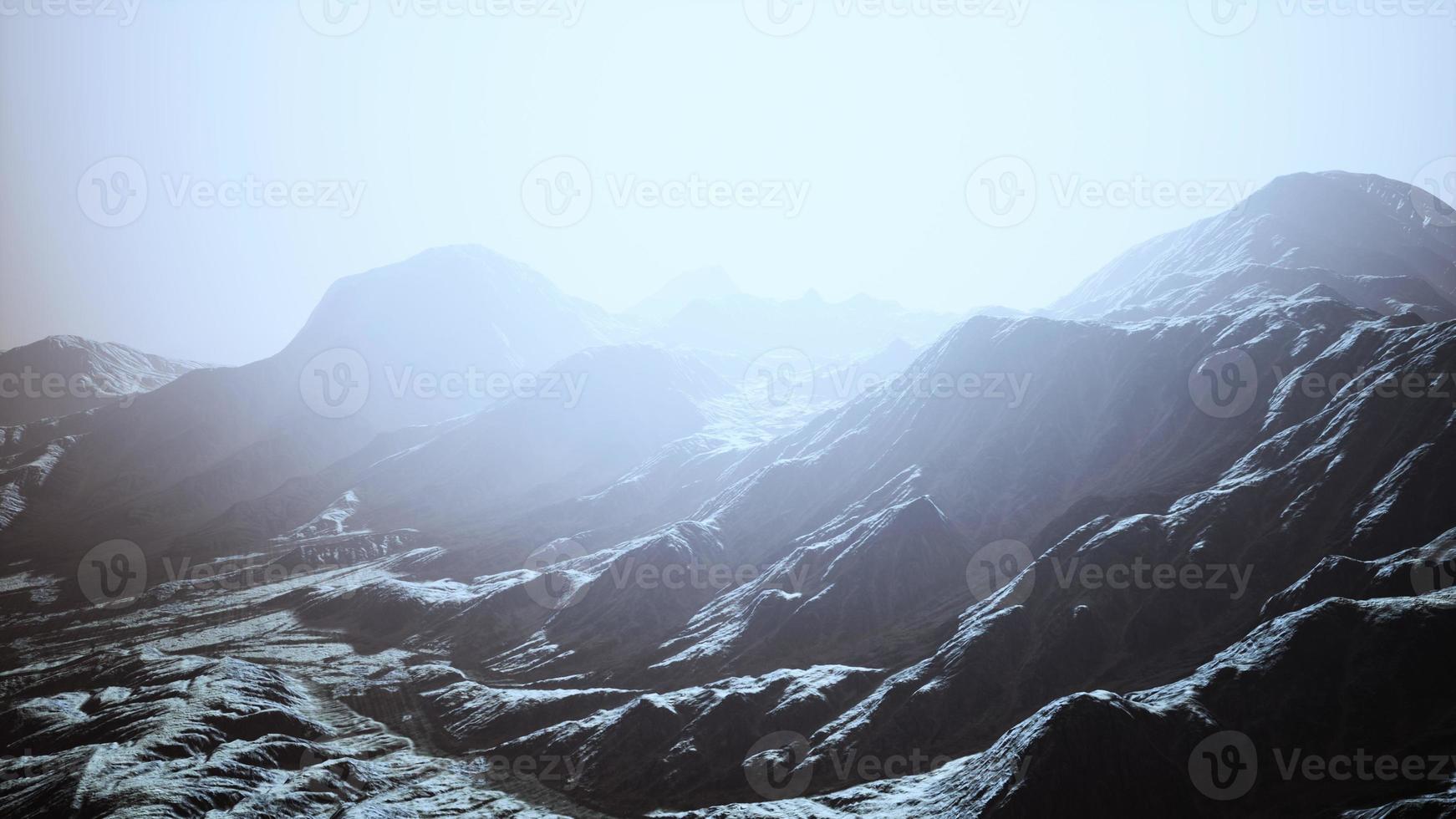 the sun rays illuminate the beautiful panorama of the Carpathian mountains photo