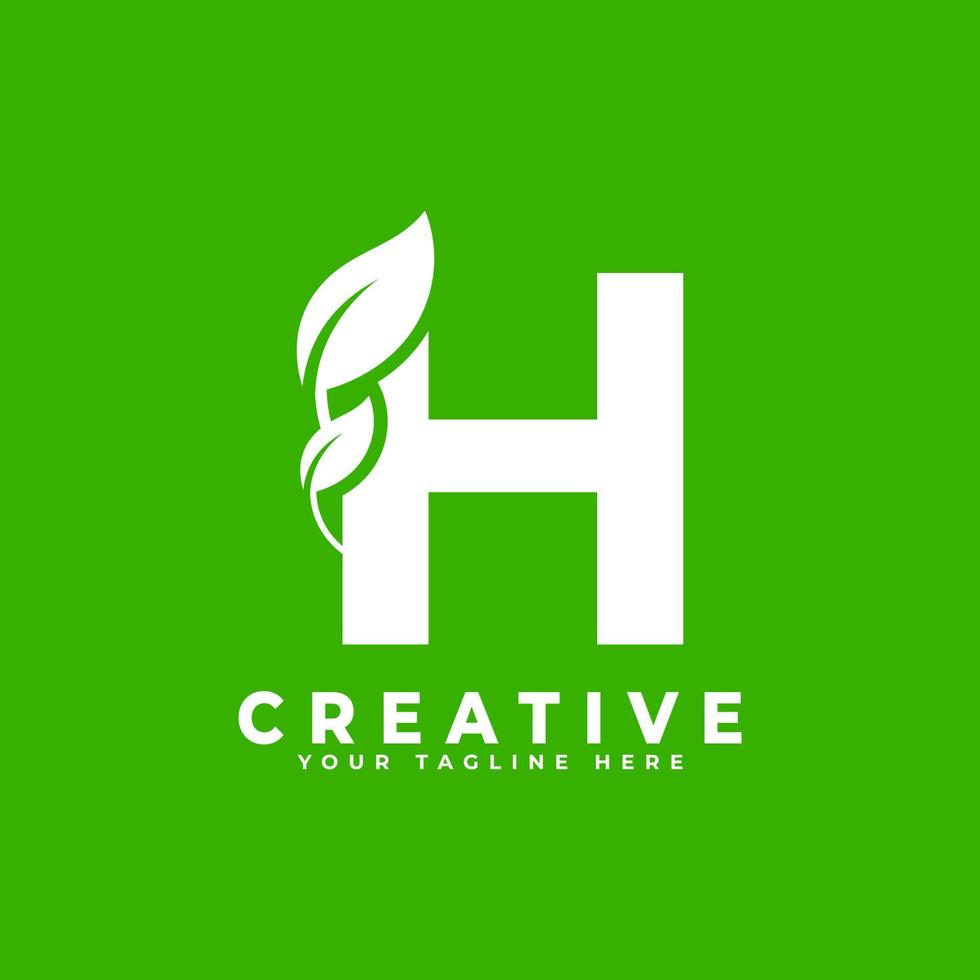 letra h con elemento de diseño de logotipo de hoja sobre fondo verde. utilizable para logotipos de negocios, ciencia, salud, medicina y naturaleza vector