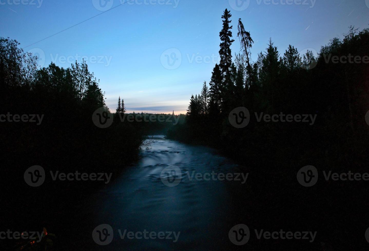 Woody River at night in scenic Saskatchewan photo