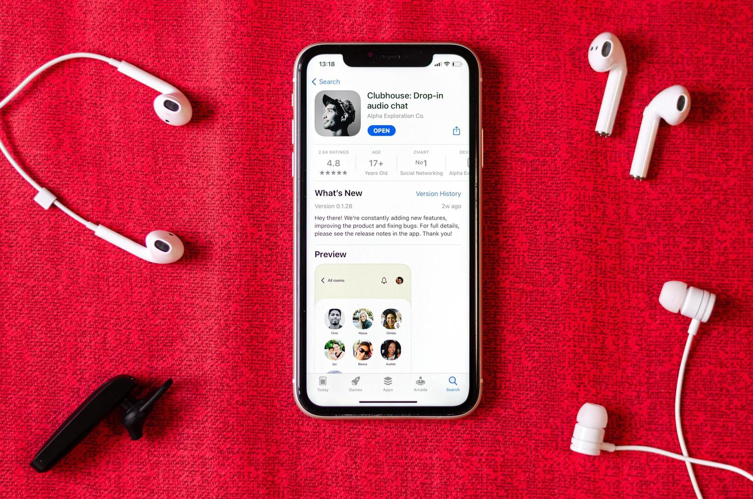 Clubhouse drop-in audio chat application view on smartphone screen photo