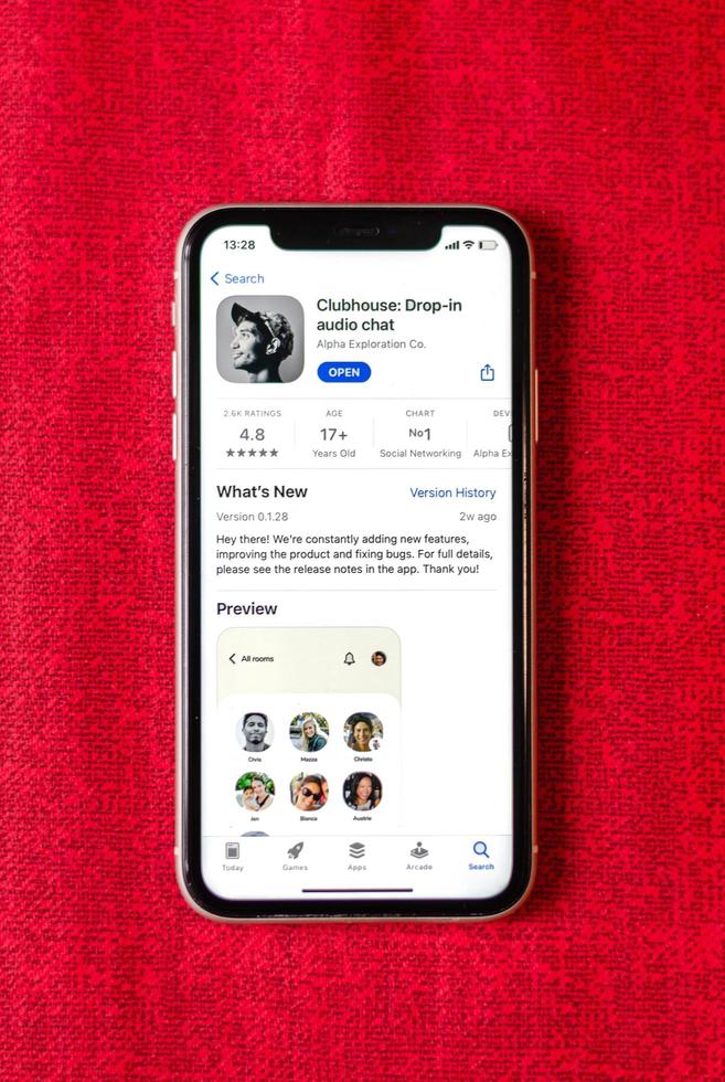 Clubhouse drop-in audio chat application view on smartphone screen photo