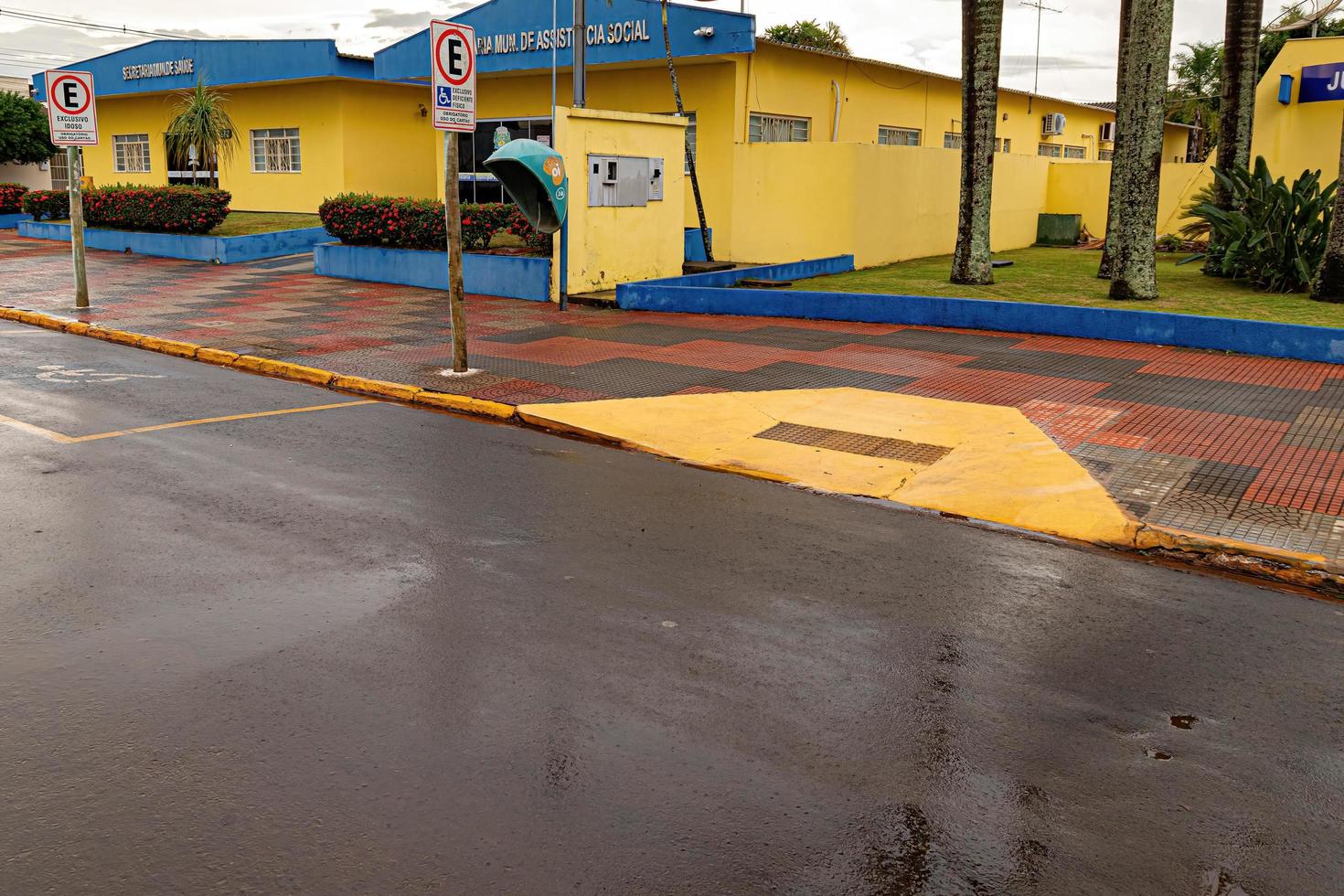 Access ramp from asphalt to sidewalk photo