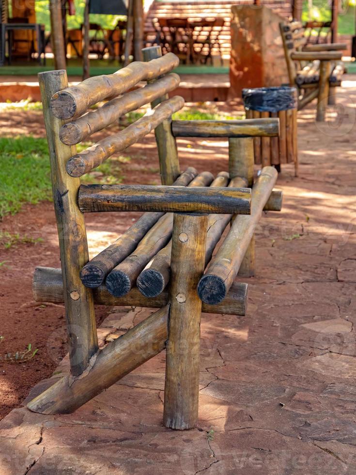 wooden bench in an open area photo