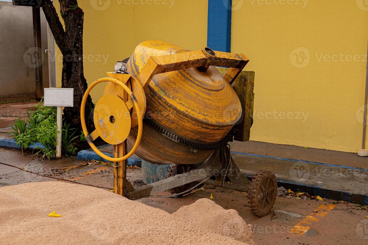 Yellow concrete mixer photo