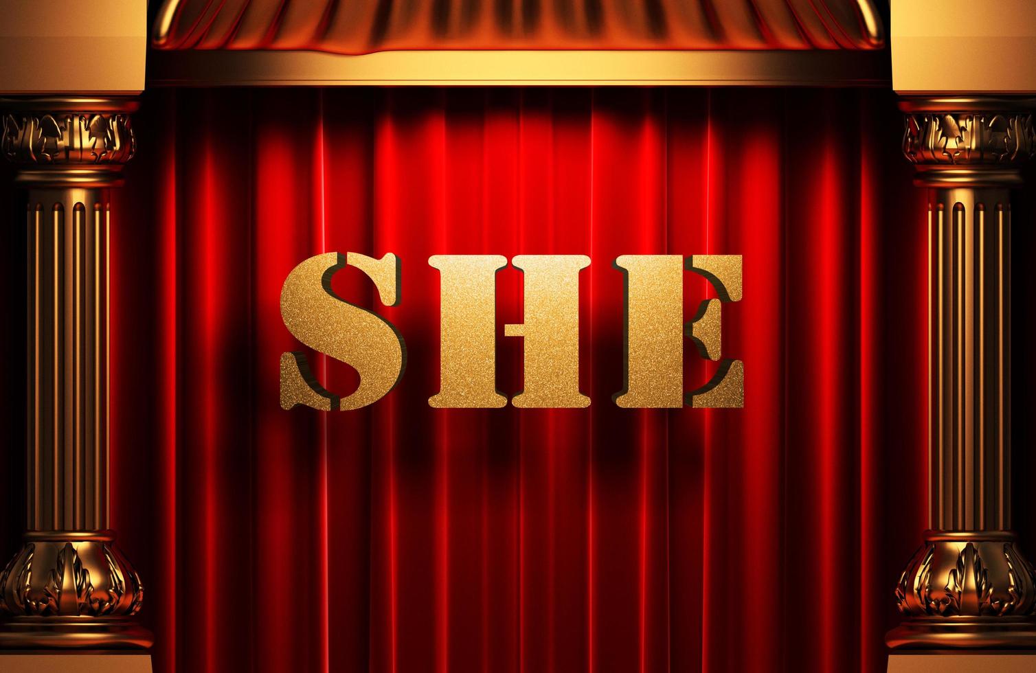 she golden word on red curtain photo