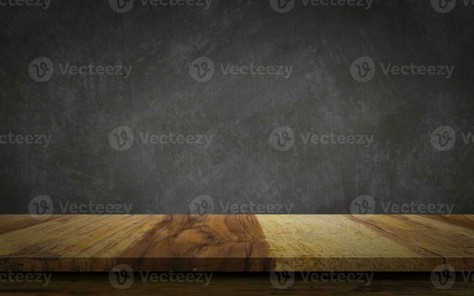Empty wood table top on chalkboard background. photo