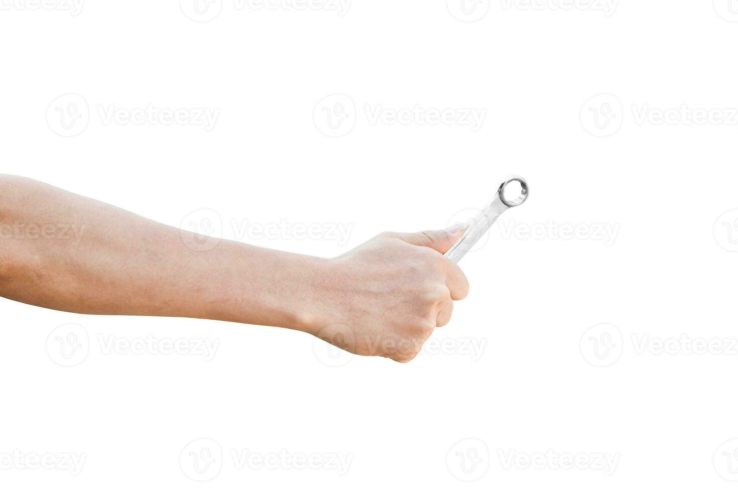 Hand holding a spanner isolated on a white background with clipping path. photo