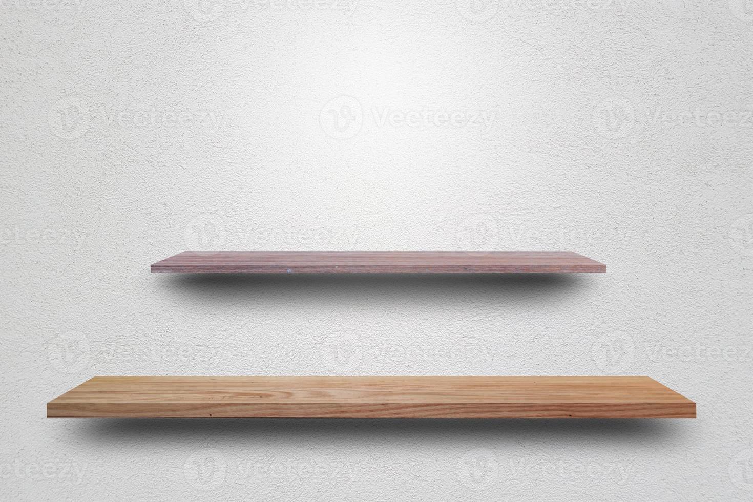 Front view empty wooden shelf and grey wall. Design concept photo