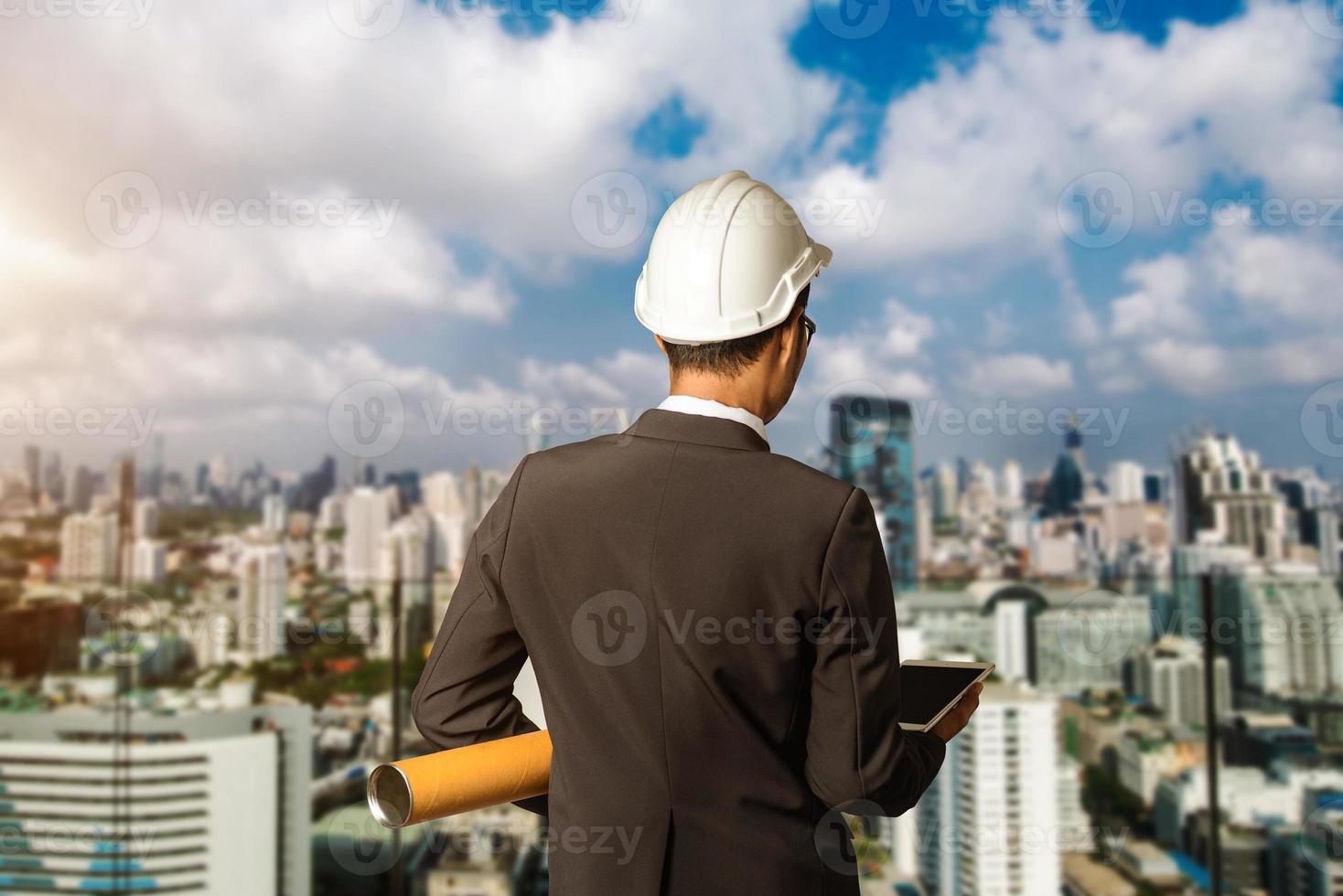 engineer with Creative architect projecting .The concept of engineering, construction, city life photo