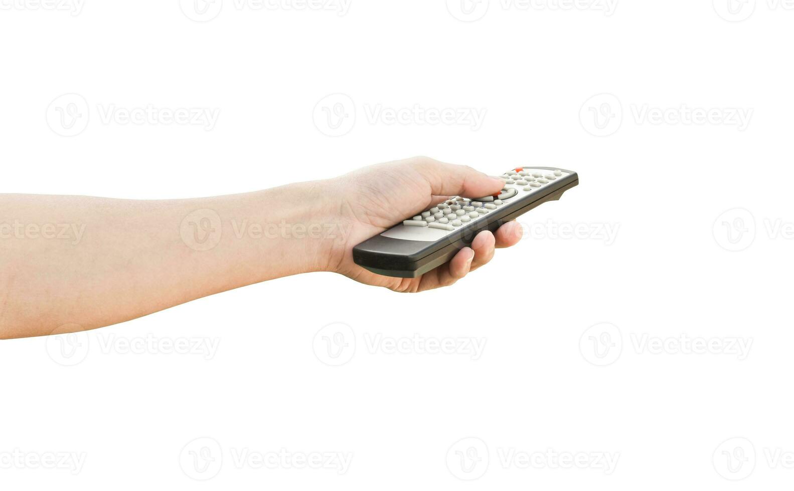 Hand holding television remote control, isolated on white background with clipping path. photo