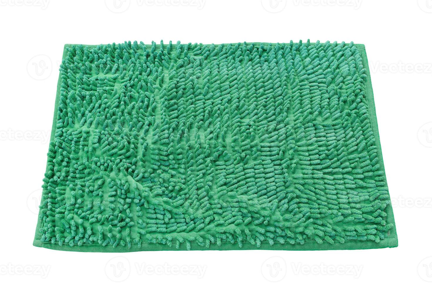 Blank green welcome mat isolated on white background. photo