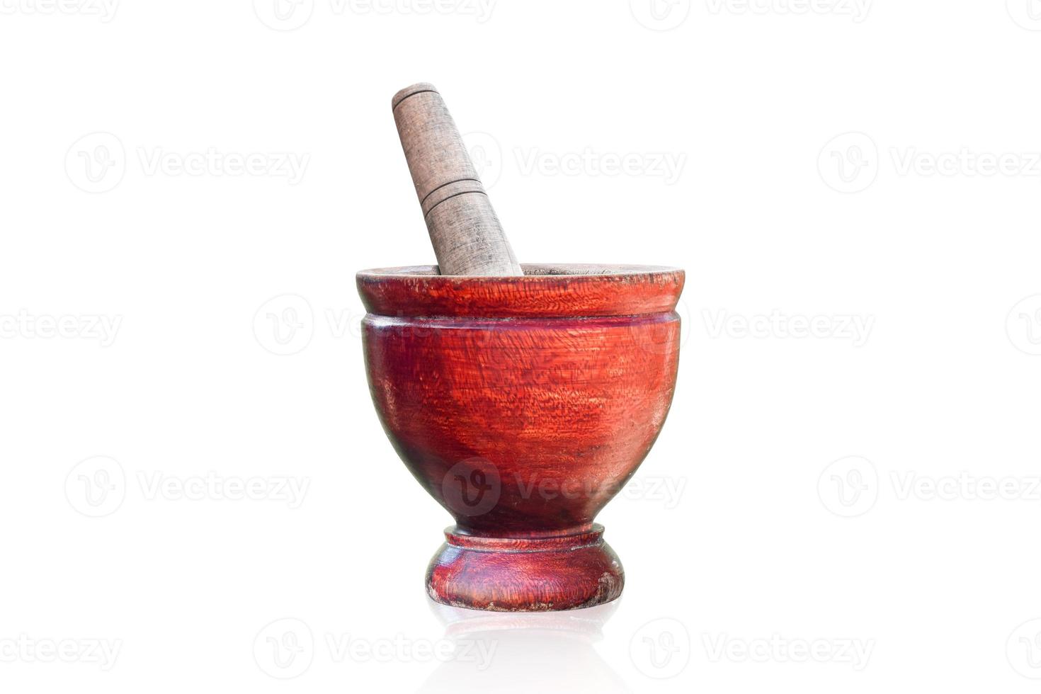 Wooden mortar and pestle isolated on white background with clipping path. for use kitchen utensils. photo