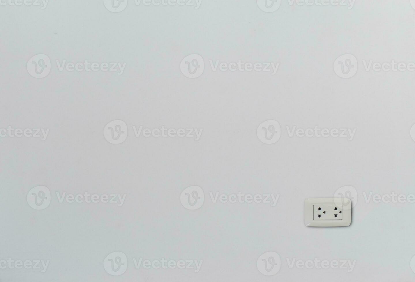 Modern thailand power outlet on white plaster wall with copy space photo
