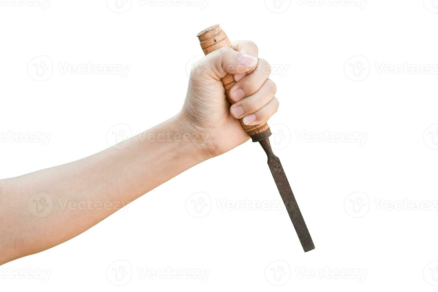 Hand holding old rusty chisel isolated on white background with clipping path. photo