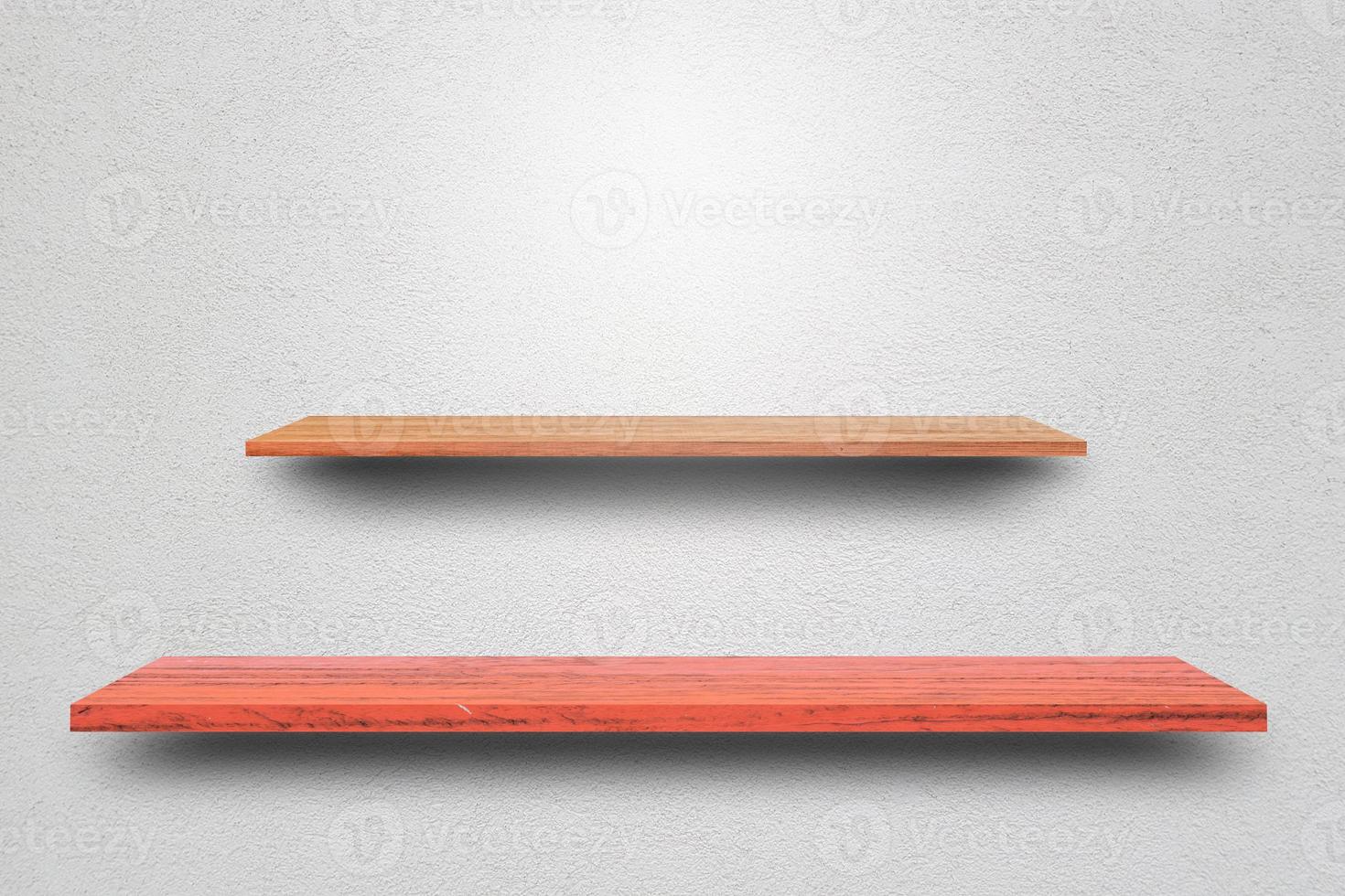 Front view empty wooden shelf and grey wall. Design concept photo