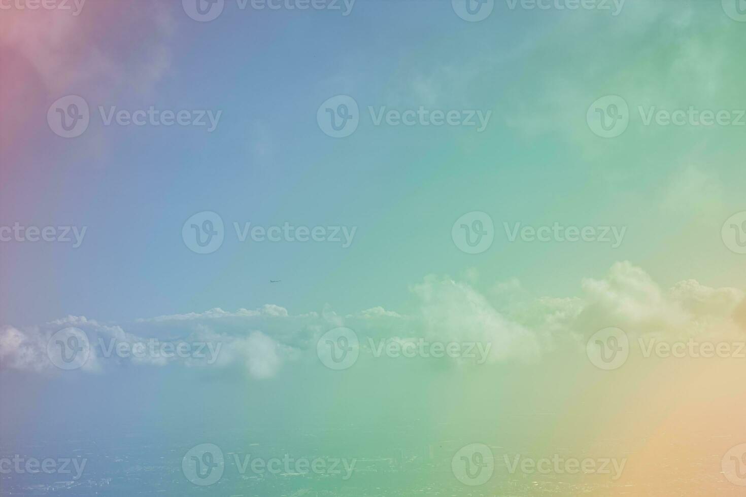 Sunshine clouds sky with a pastel soft color. Abstract blurred cyan gradient of sky nature. photo