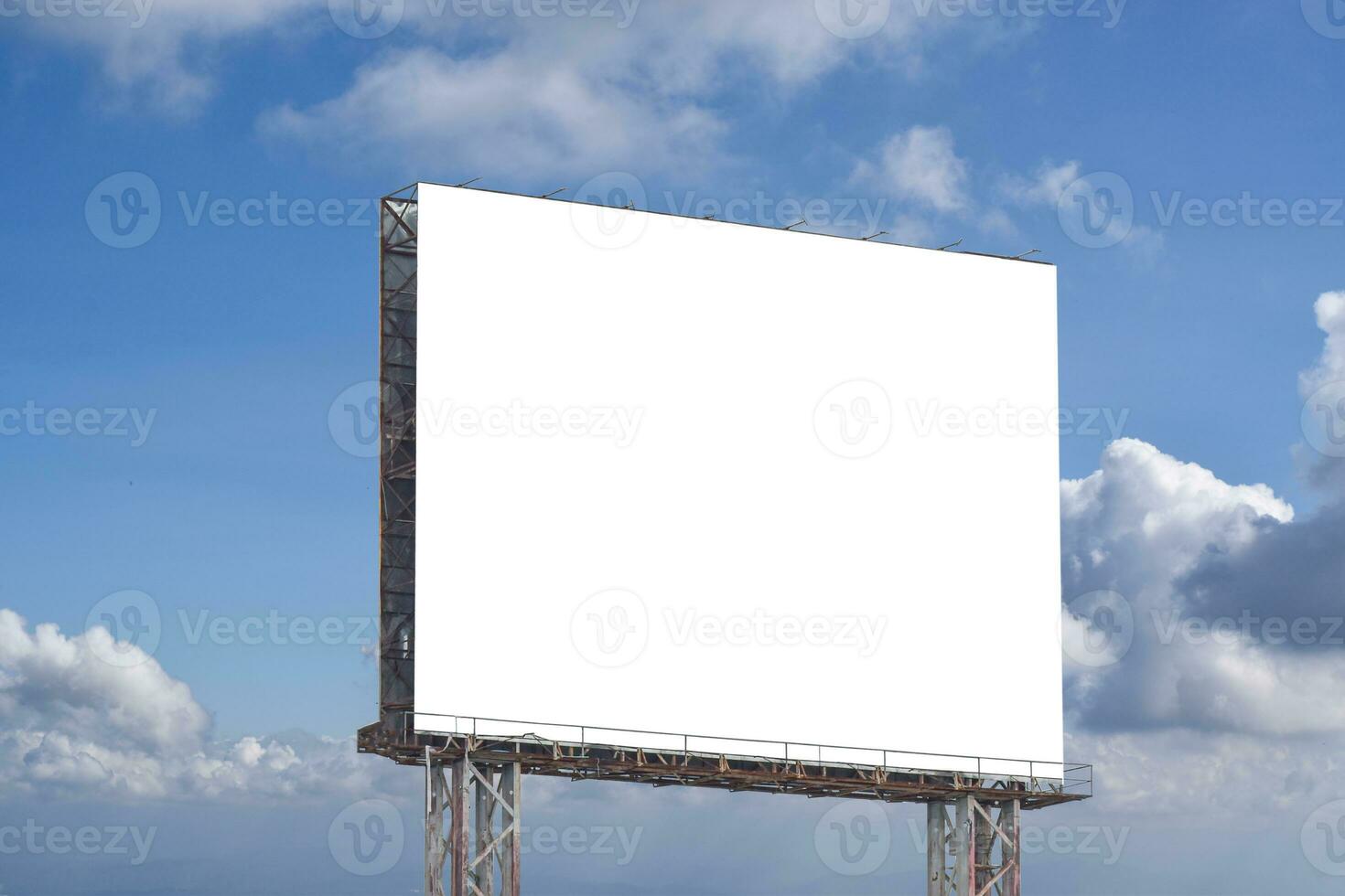 Billboard blank against blue sky background for outdoor advertising poster. photo