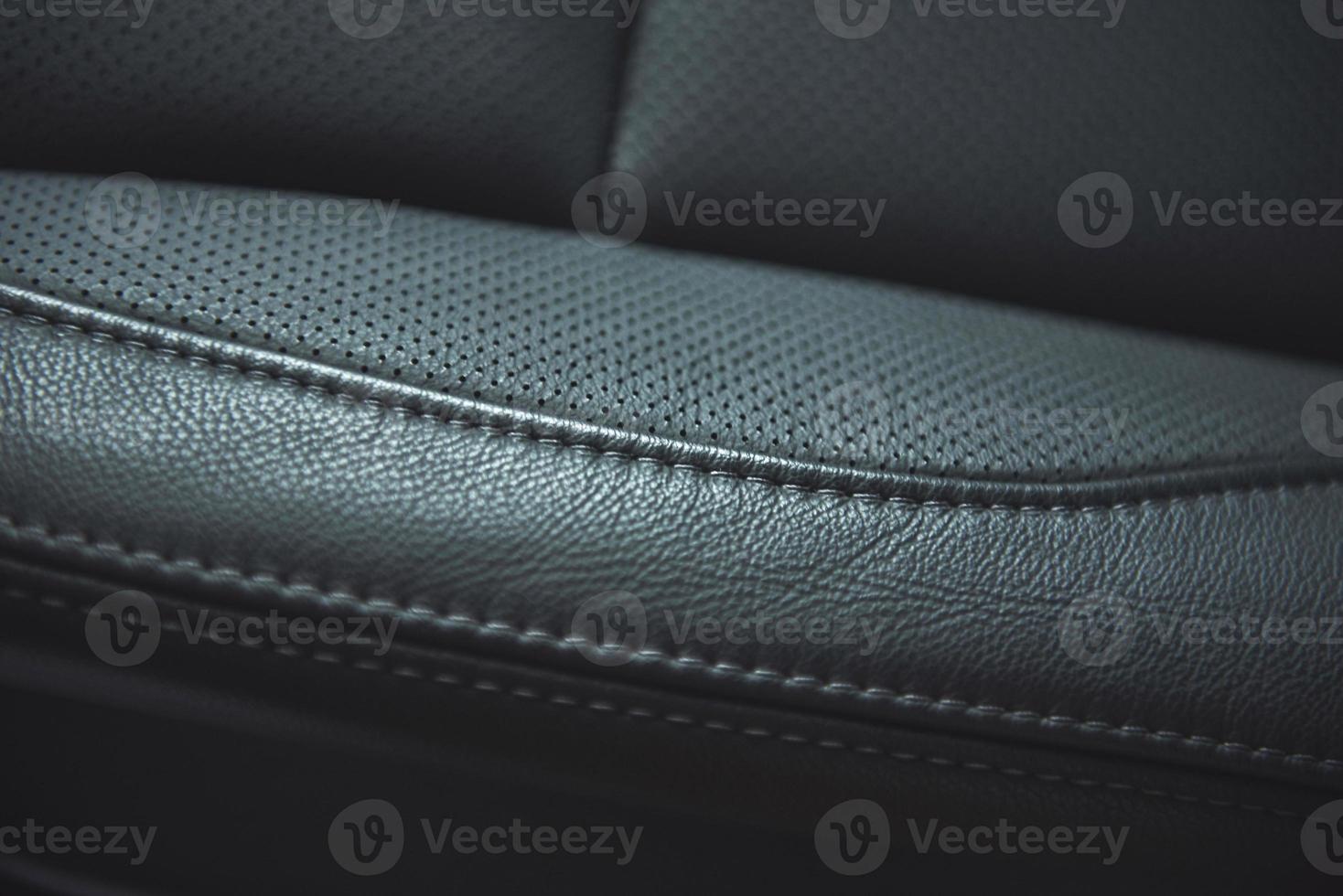 Leather background Part of car seat. Macro photo