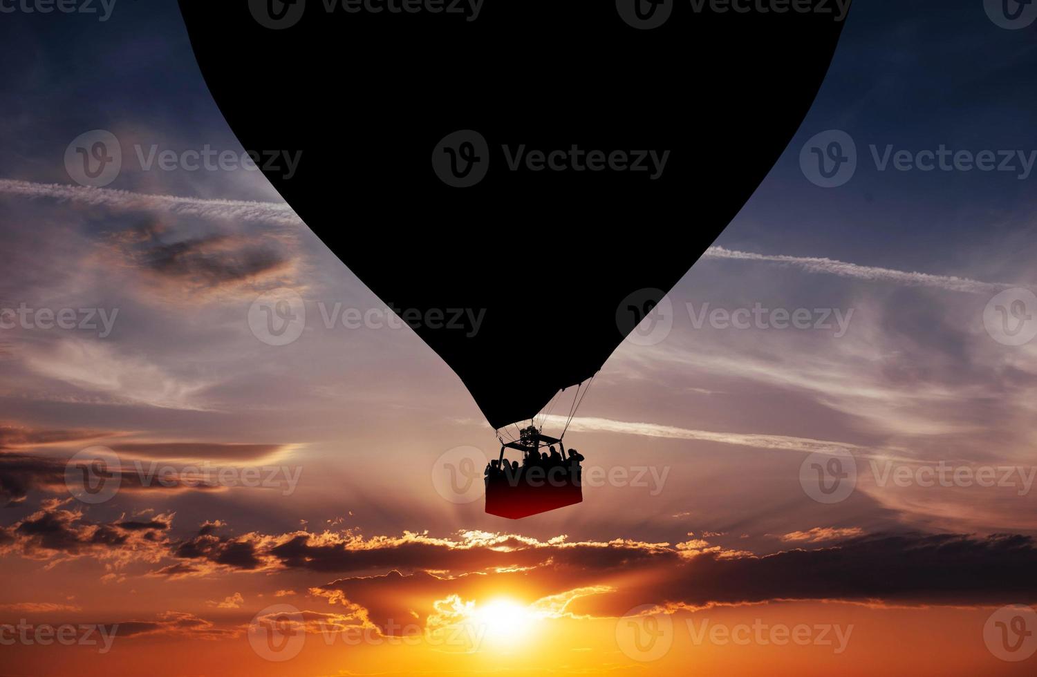 Balloon silhouette in the sunset photo