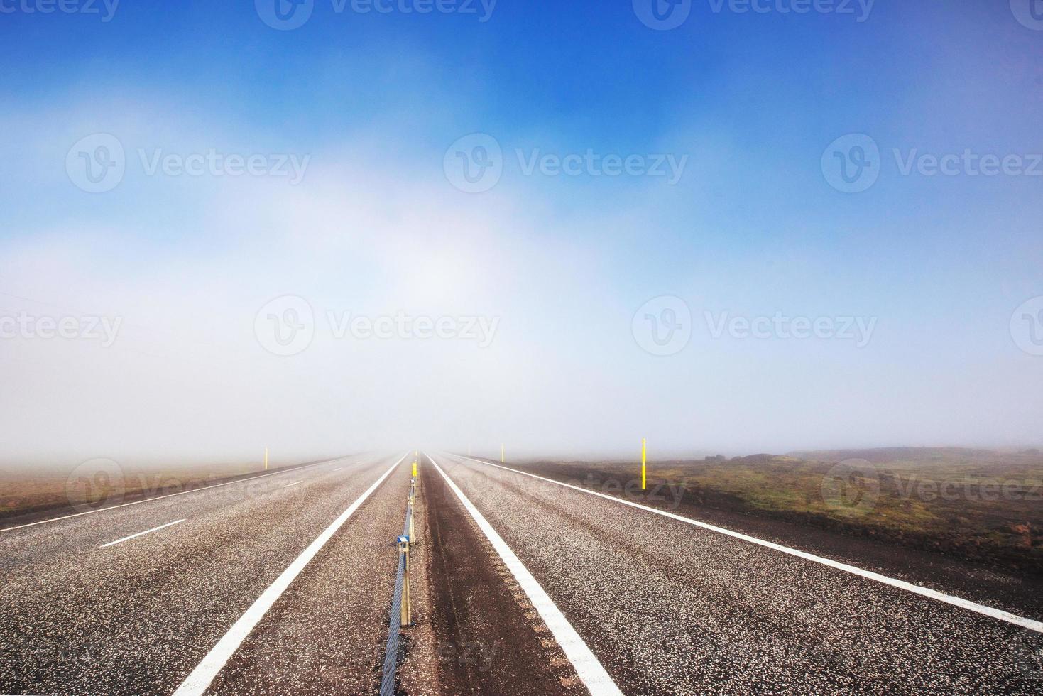 Asphalt road to the mountains Iceland. Beauty world photo