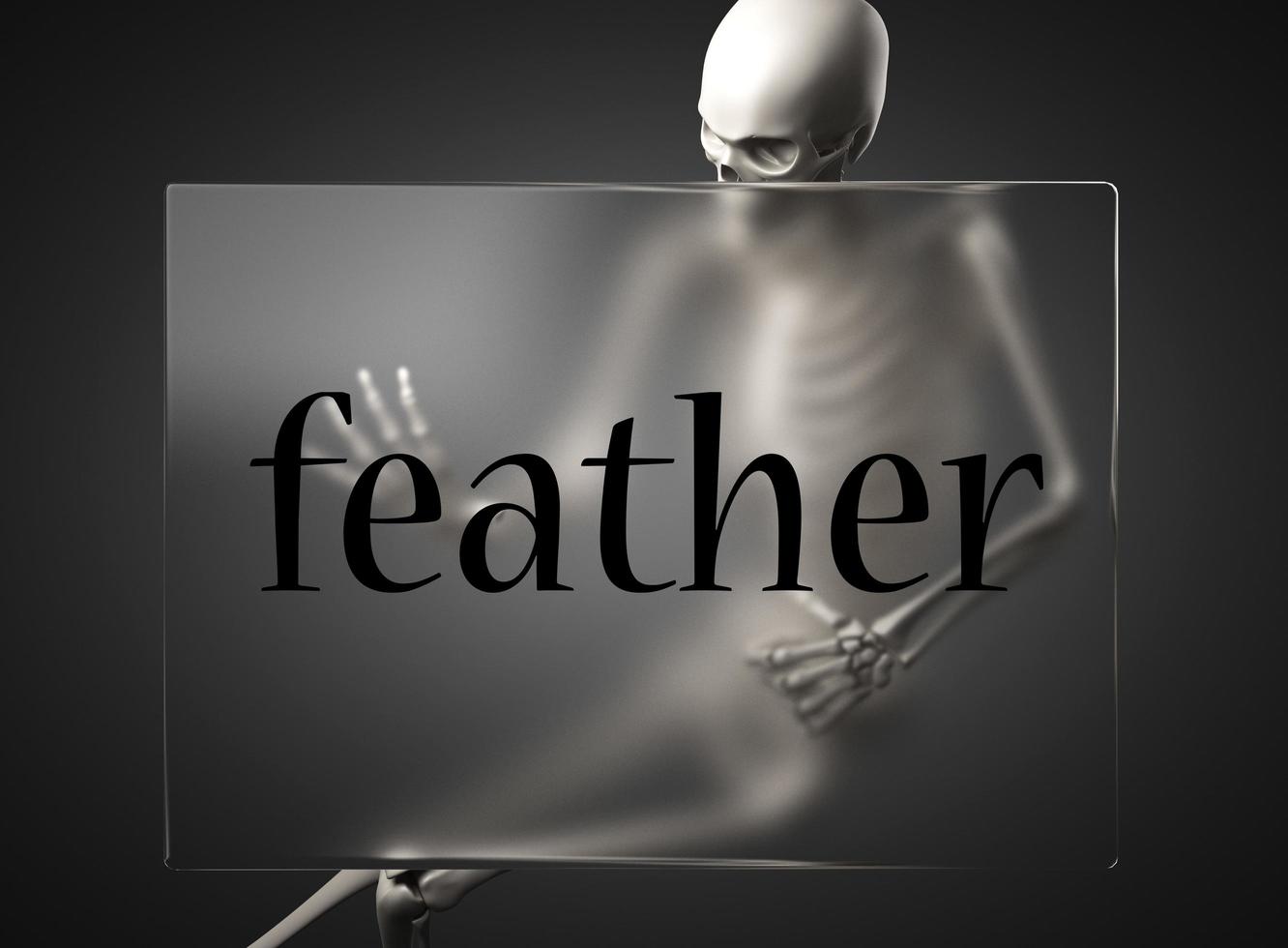 feather word on glass and skeleton photo