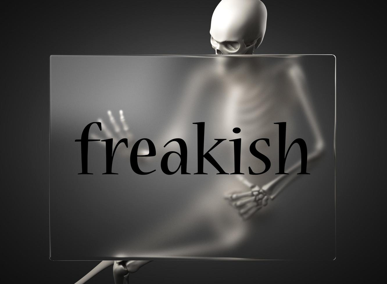 freakish word on glass and skeleton photo