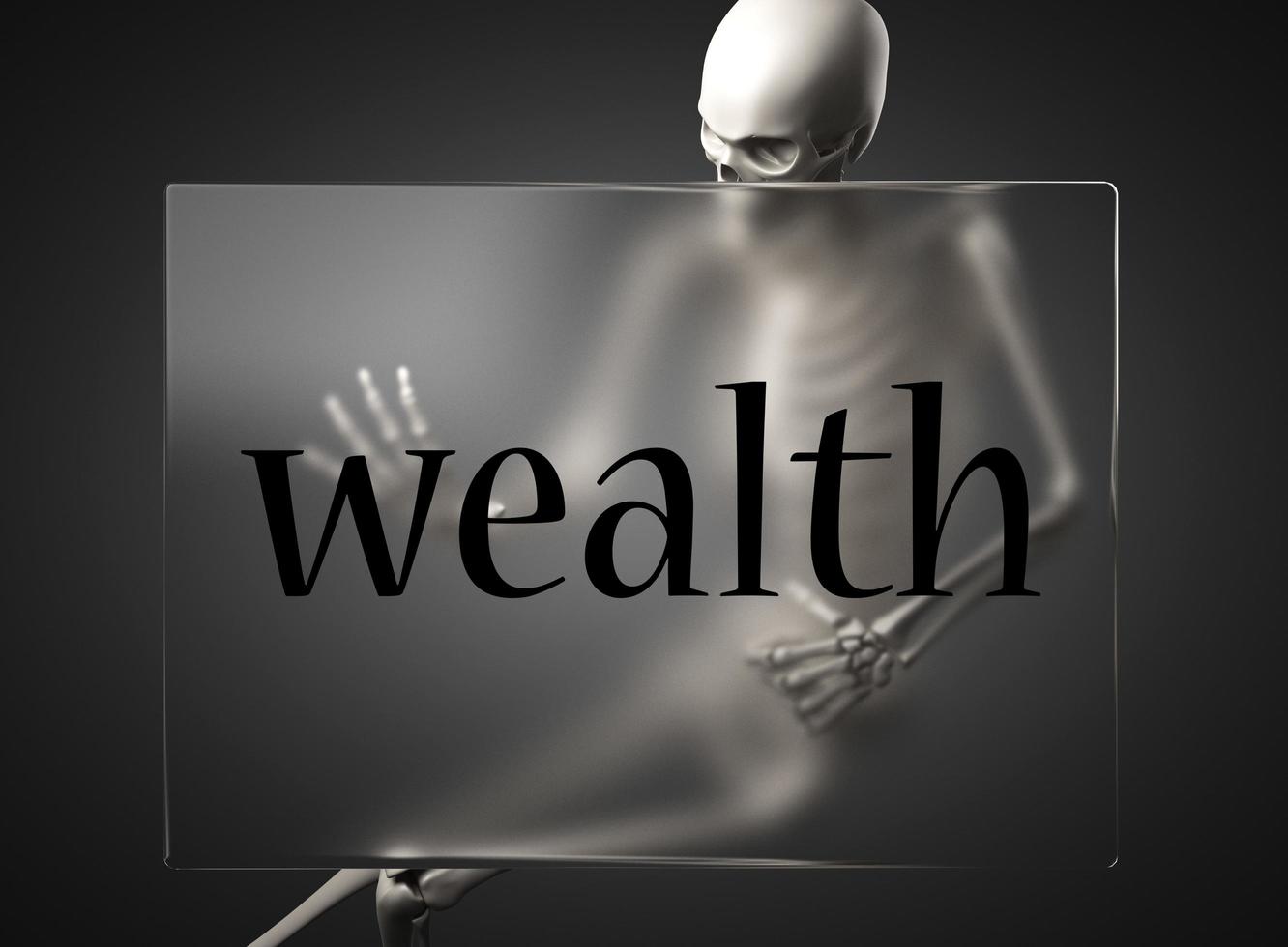 wealth word on glass and skeleton photo