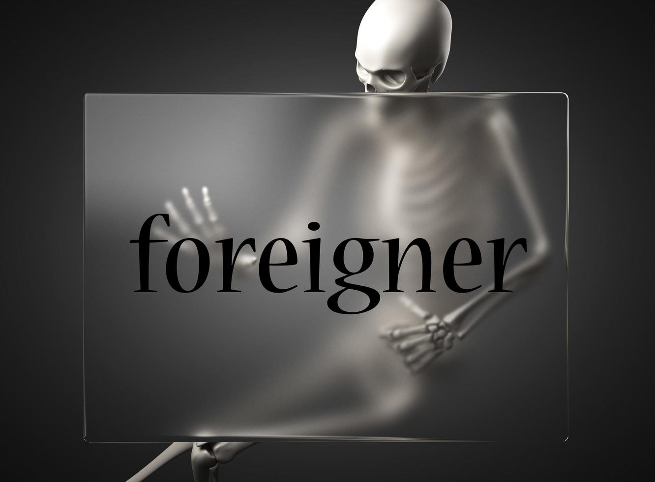 foreigner word on glass and skeleton photo