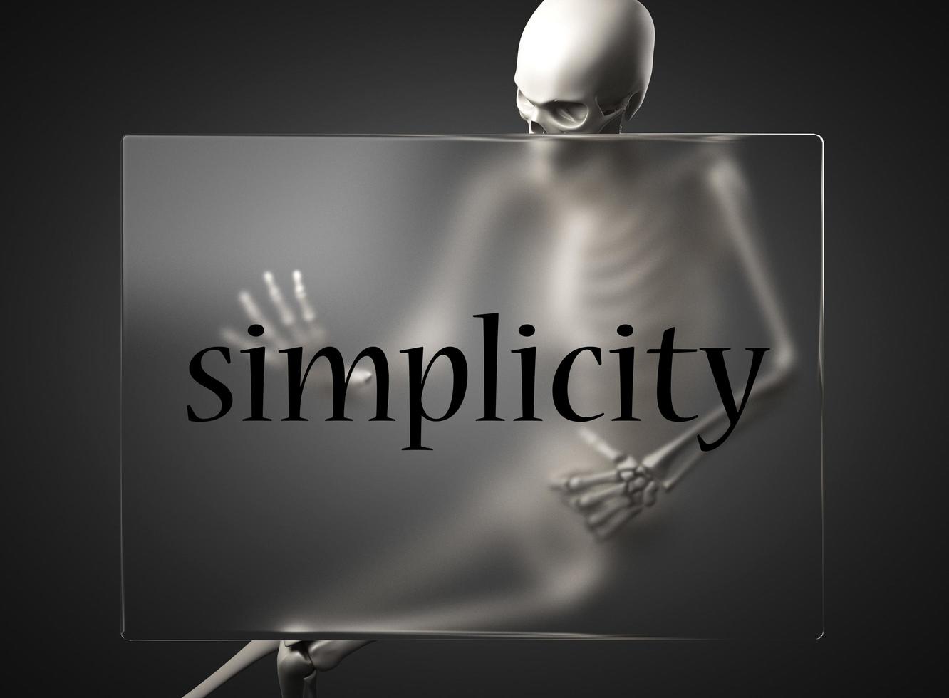 simplicity word on glass and skeleton photo