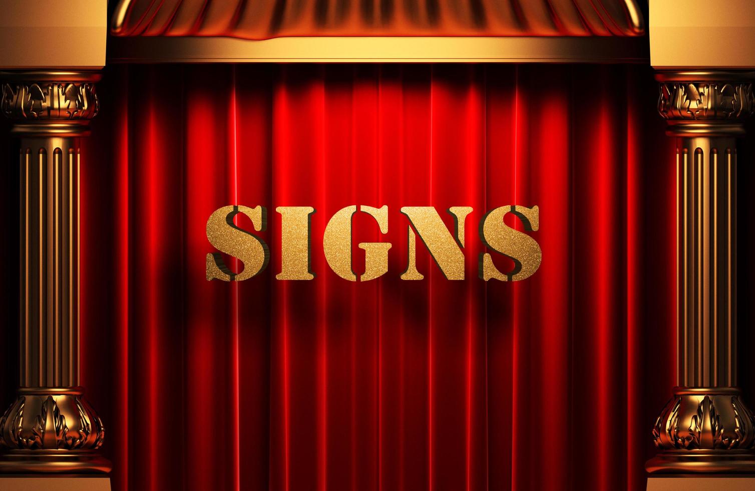 signs golden word on red curtain photo
