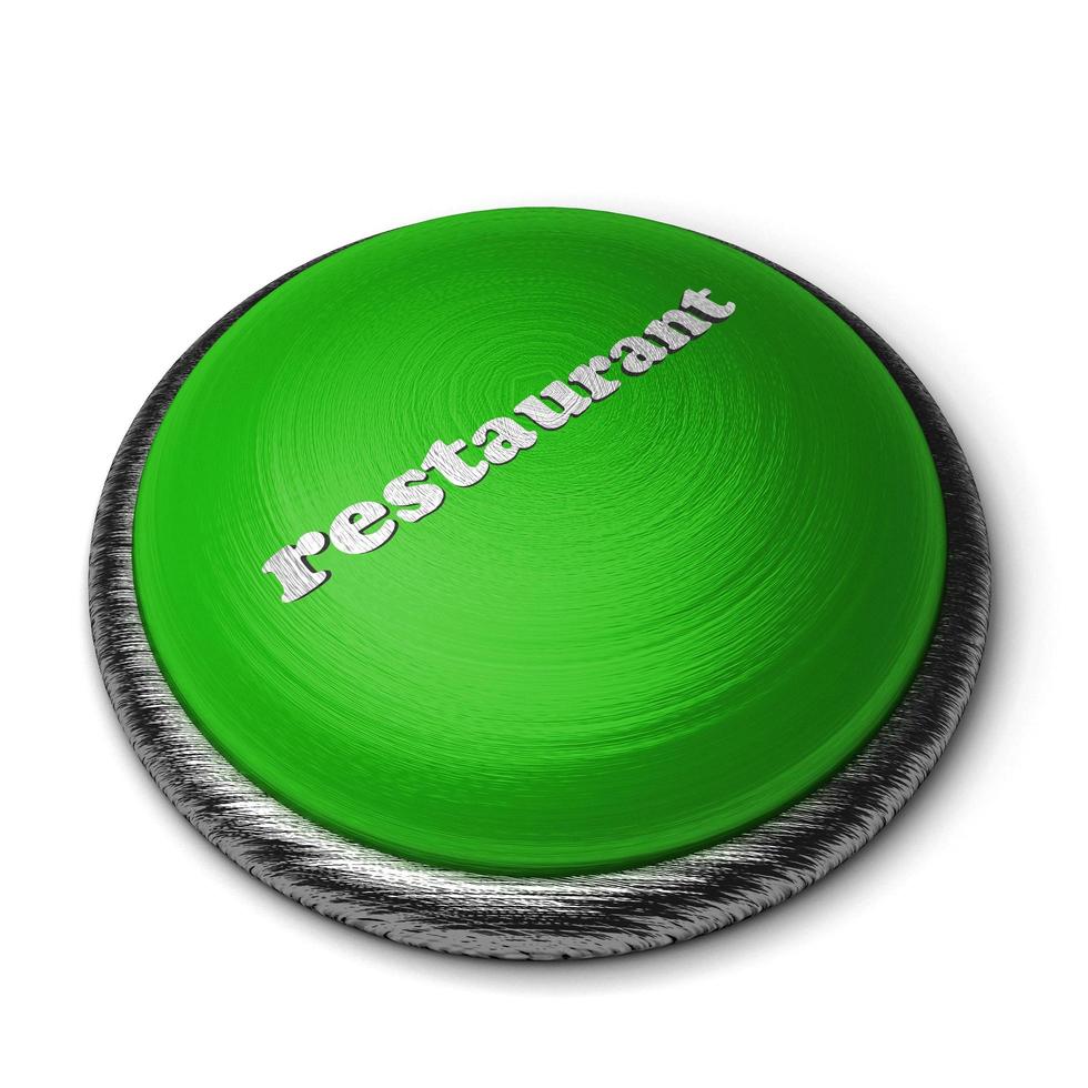 Palabra de restaurante en el botón verde aislado en blanco foto
