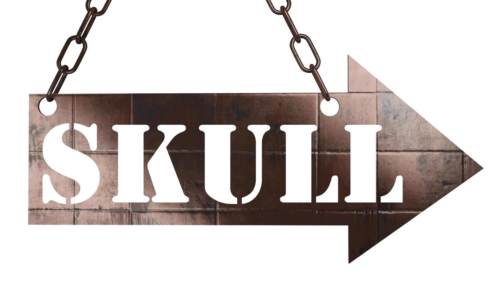 skull word on metal pointer photo