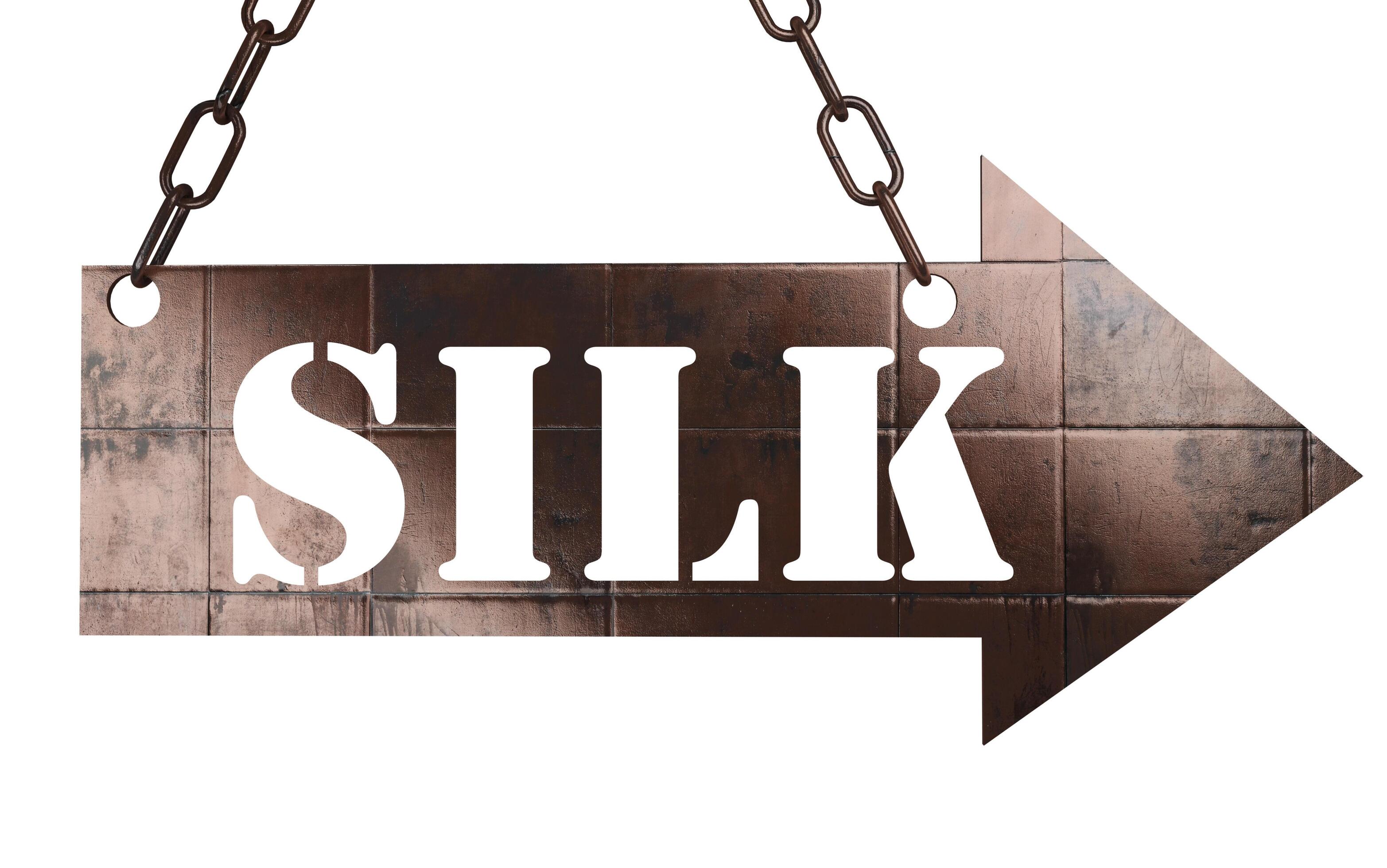 silk word on metal pointer 6293641 Stock Photo at Vecteezy