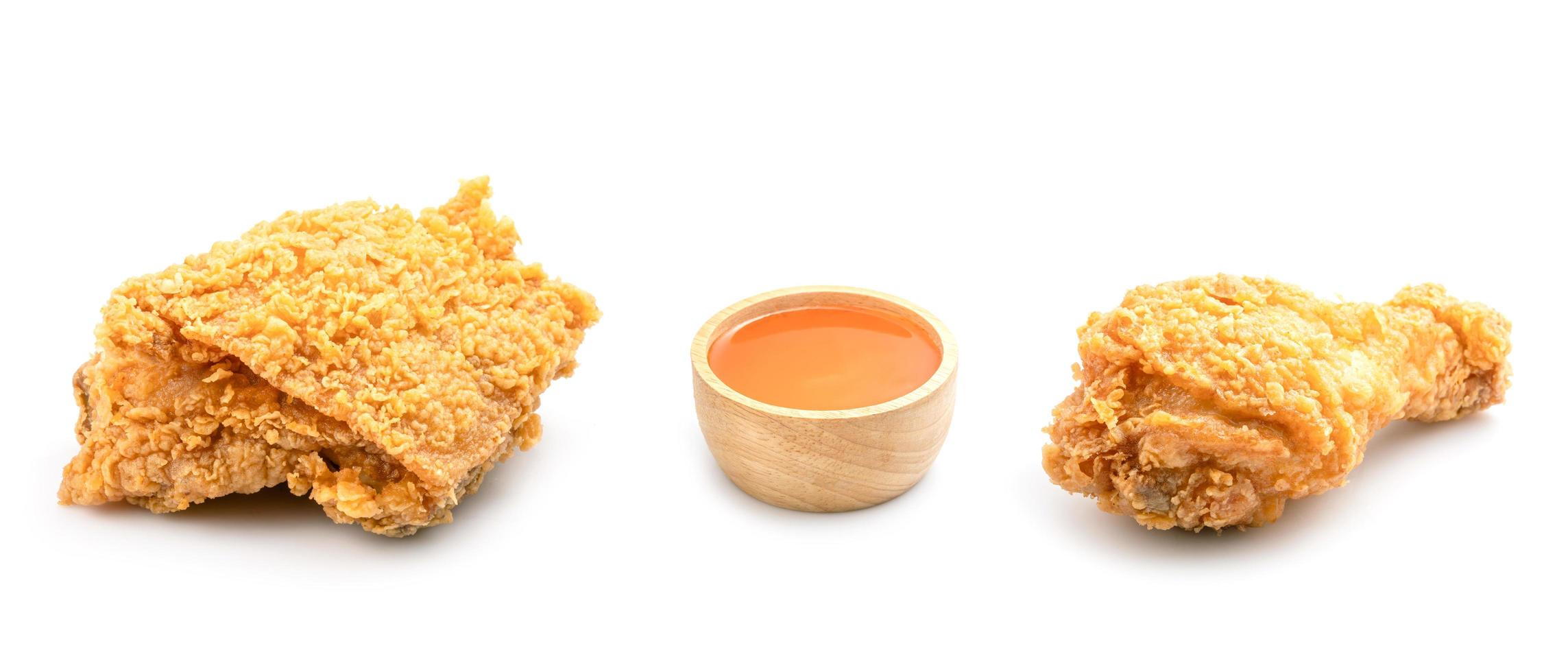 Set of fried chicken and chilli sauce isolated on white photo