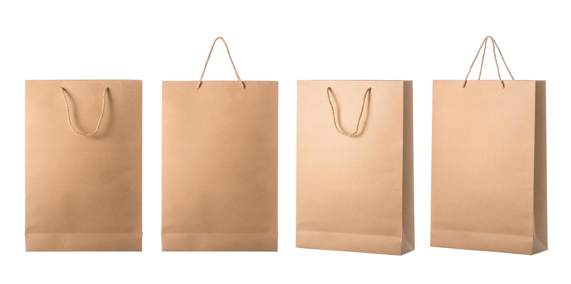 Set of new blank brown paper bag for shopping. Studio shot isolated on white photo