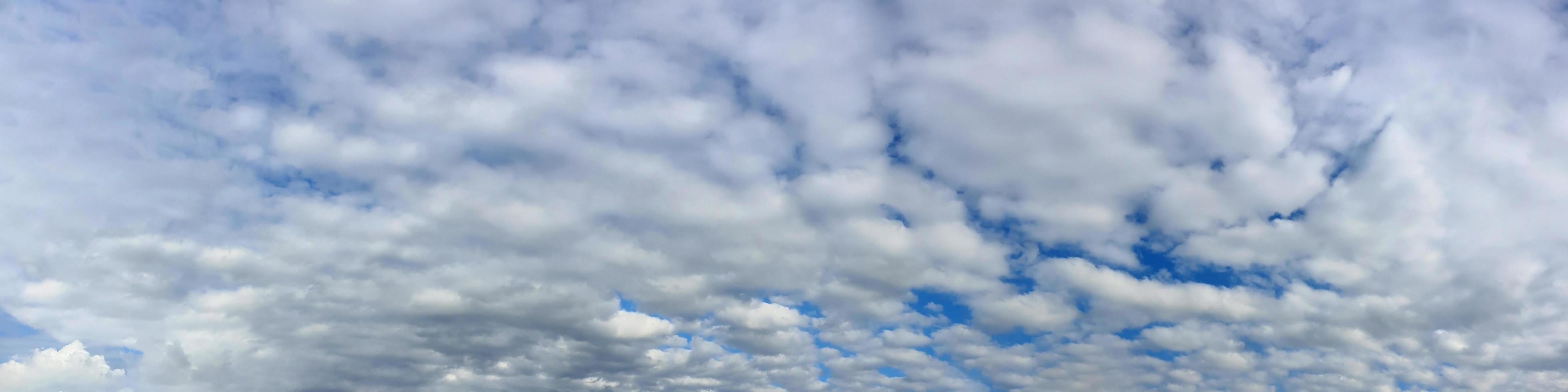Dramatic panorama sky with storm cloud on a cloudy day. photo