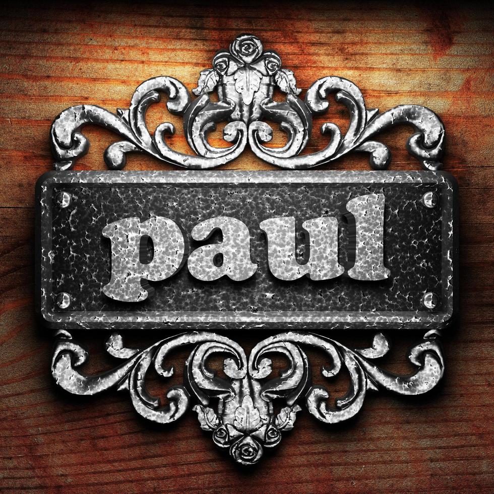 paul word of iron on wooden background photo