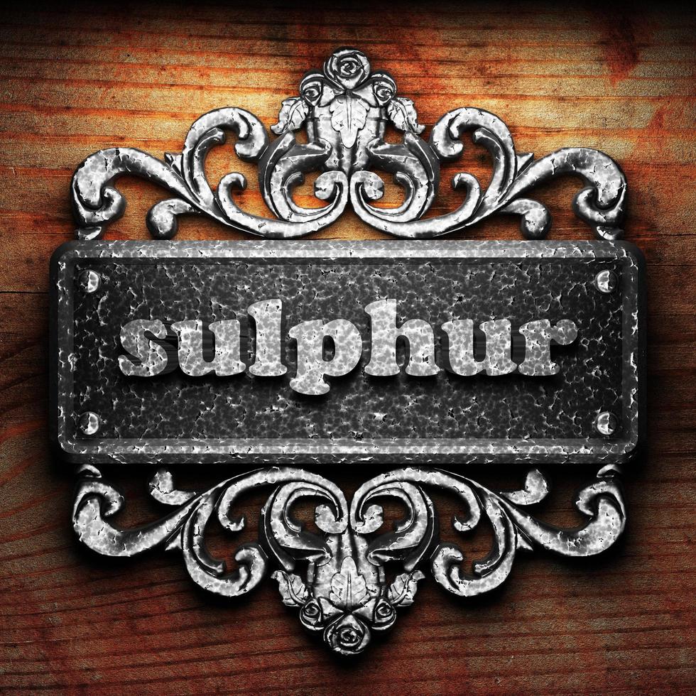 sulphur word of iron on wooden background photo