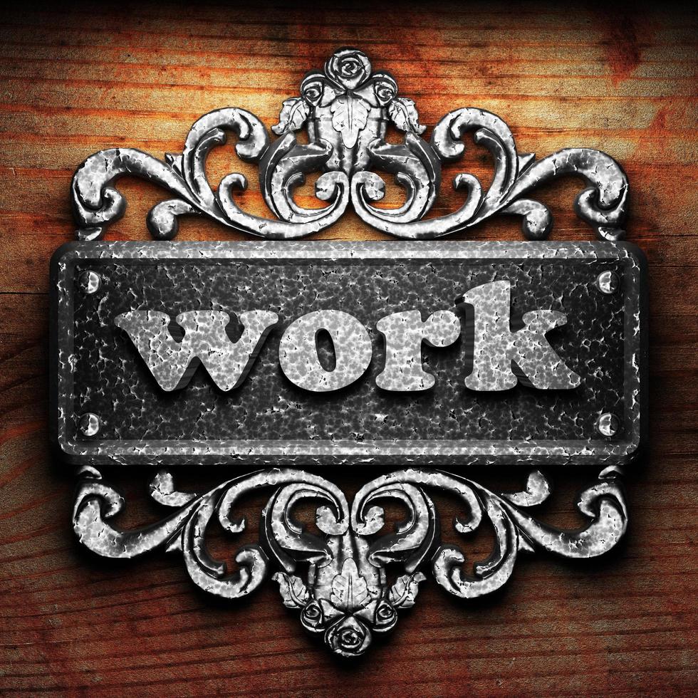 work word of iron on wooden background photo