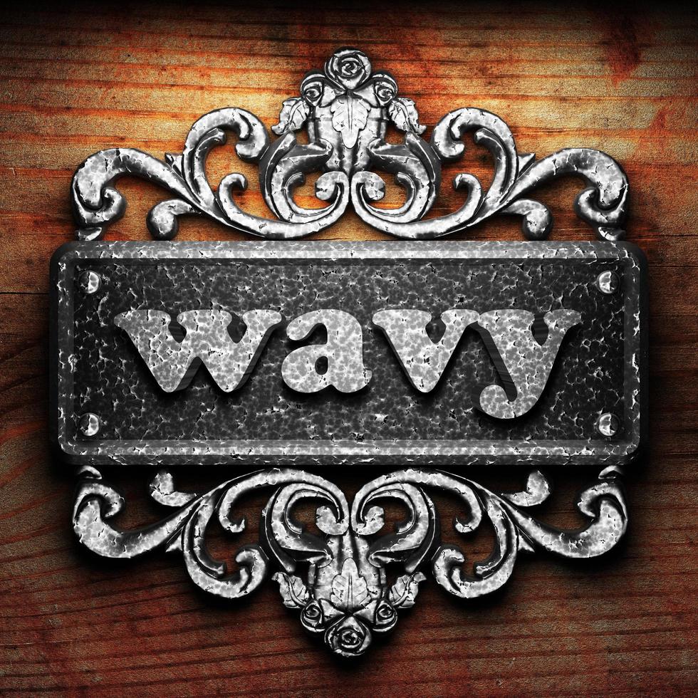 wavy word of iron on wooden background photo