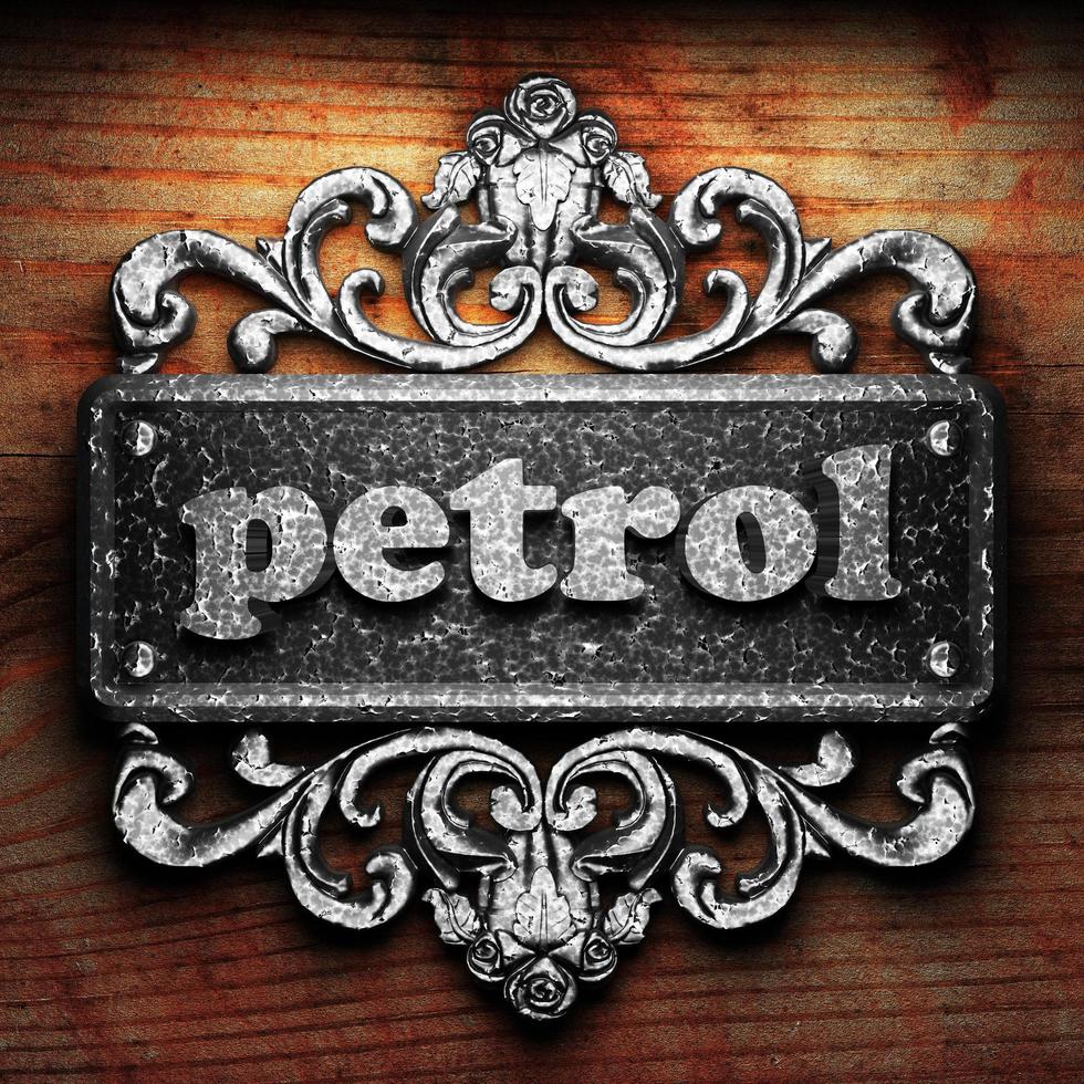 petrol word of iron on wooden background photo