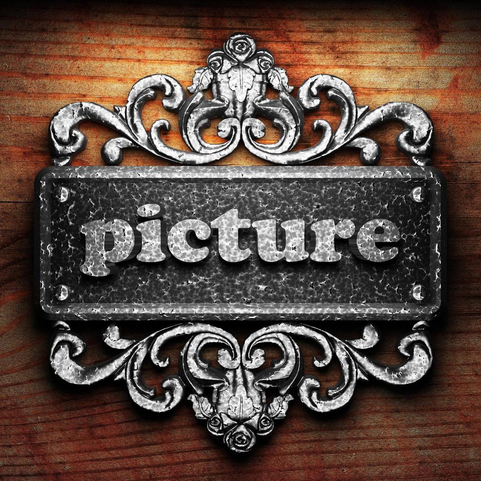 picture word of iron on wooden background photo