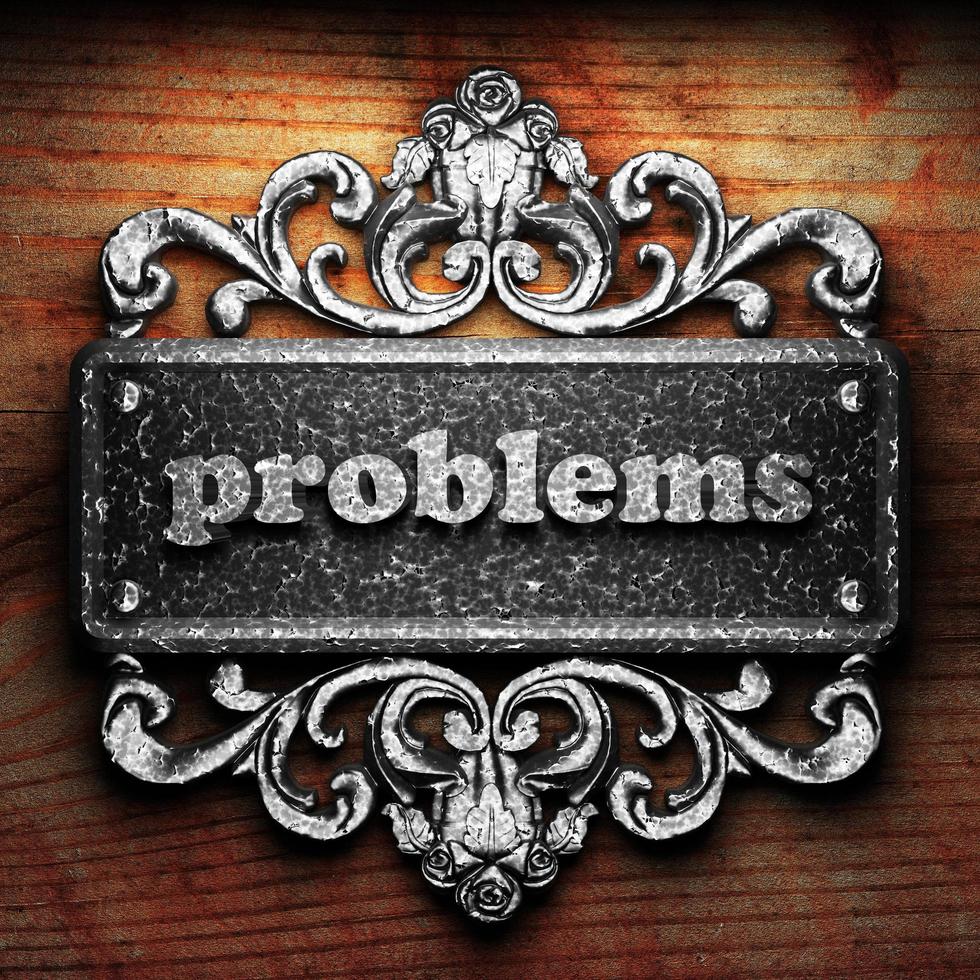 problems word of iron on wooden background photo