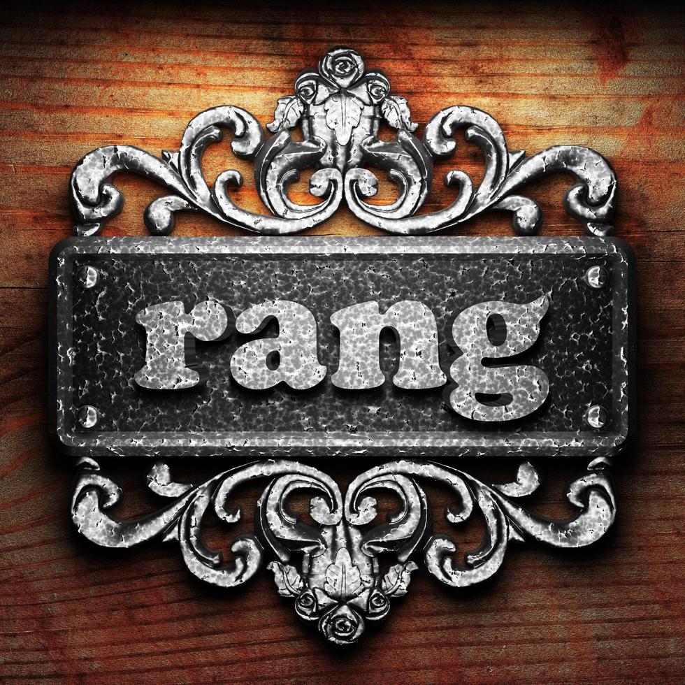 rang word of iron on wooden background photo